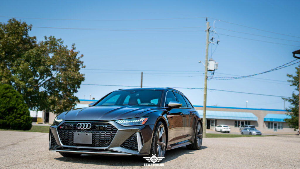 Front three-quarter view of a grey Audi RS6 Avant after front-end PPF, CSL ceramic coating and XR Plus window tint at EEwaterloo in Waterloo.