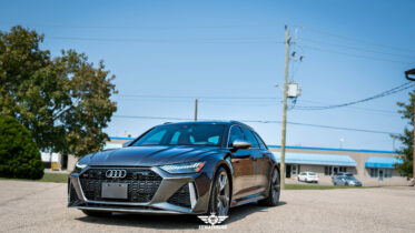 DSC08786 Front three-quarter view of a grey Audi RS6 Avant after front-end PPF, CSL ceramic coating and XR Plus window tint at EEwaterloo in Waterloo.
