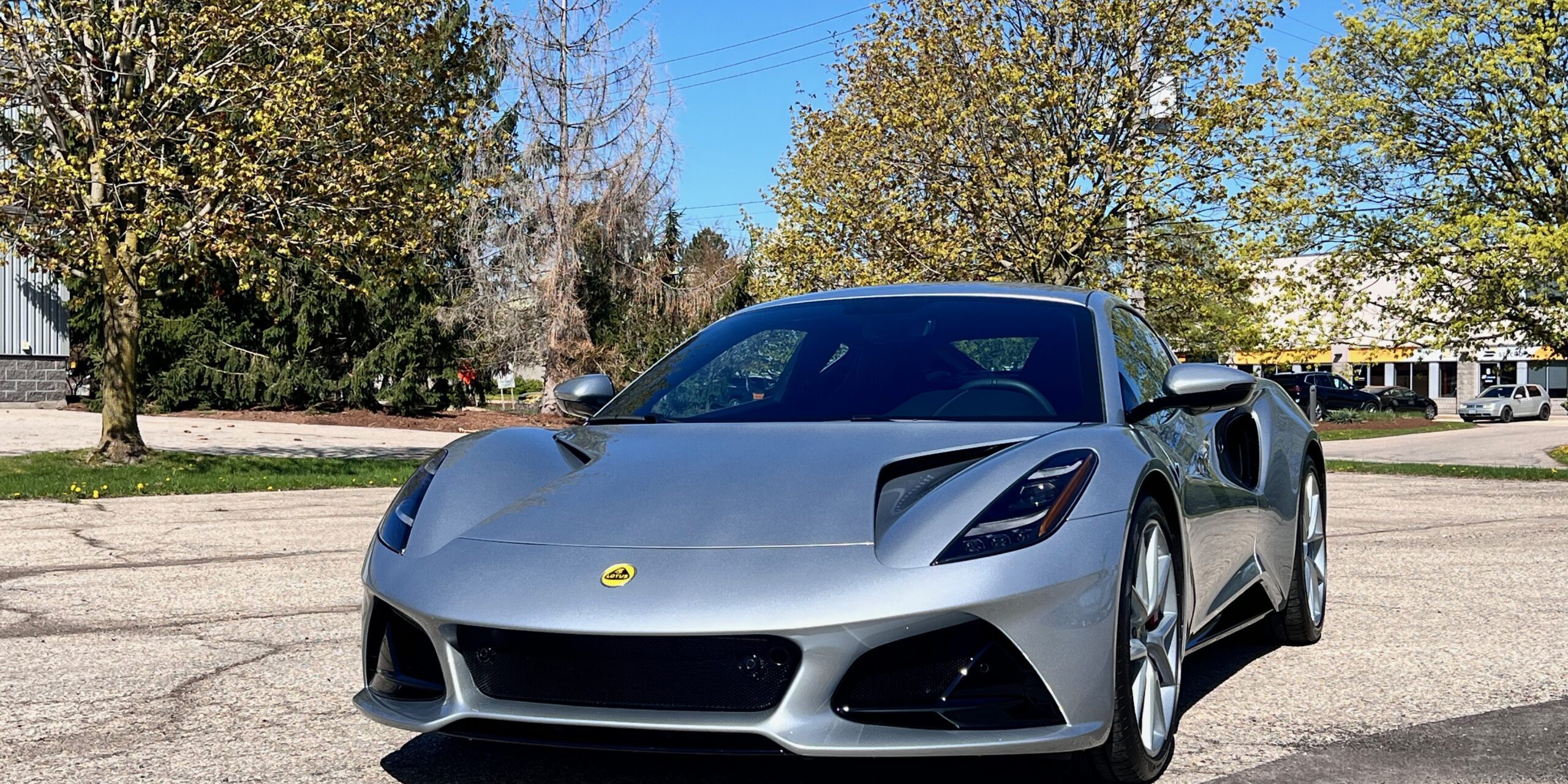Front view of a silver Lotus Emira protected with full body XPEL Ultimate Plus paint protection film.