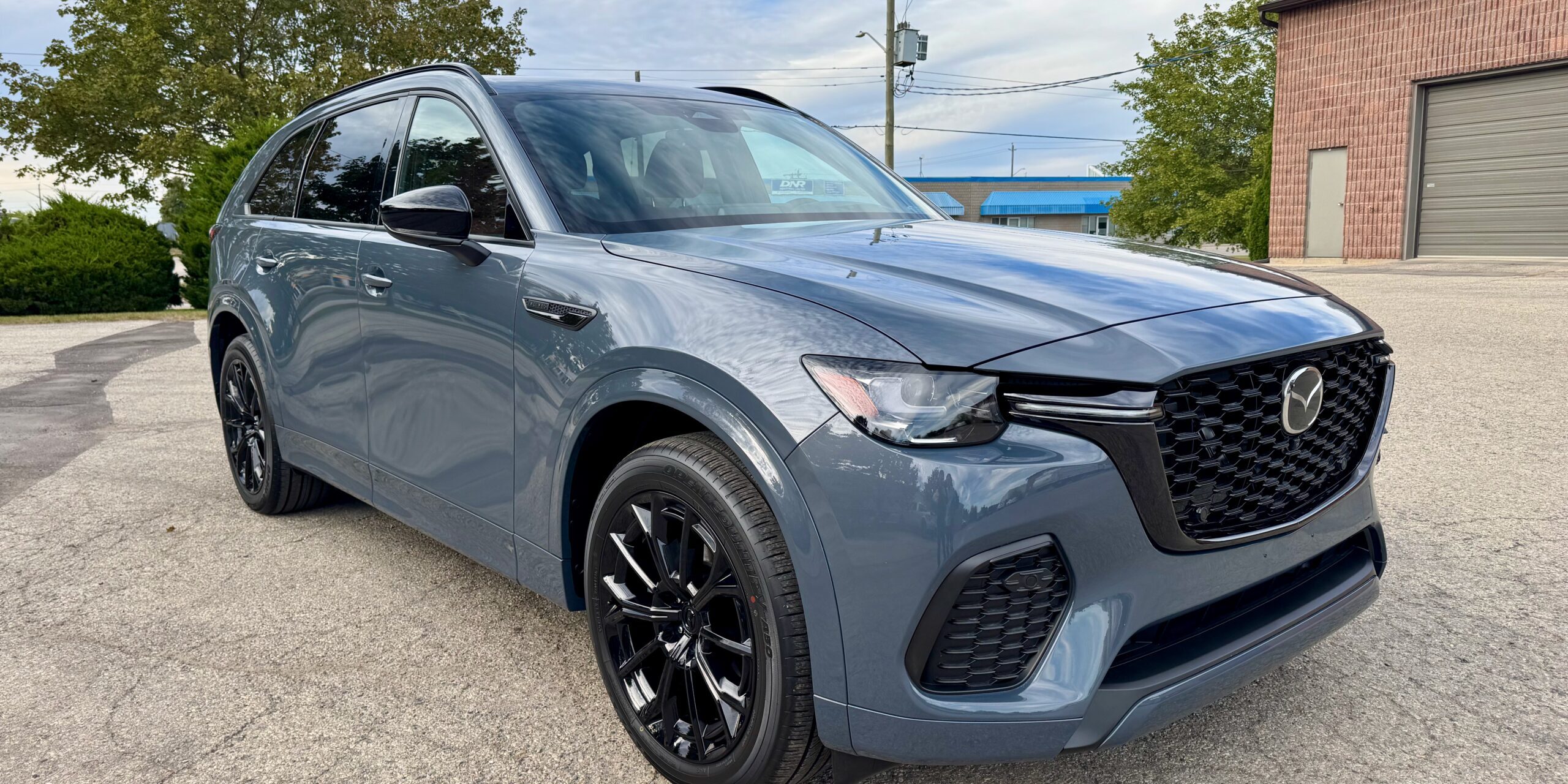 Front three-quarter view of a grey Mazda CX-70 with XPEL Ultimate Plus full front PPF and Gtechniq CSL ceramic coating.