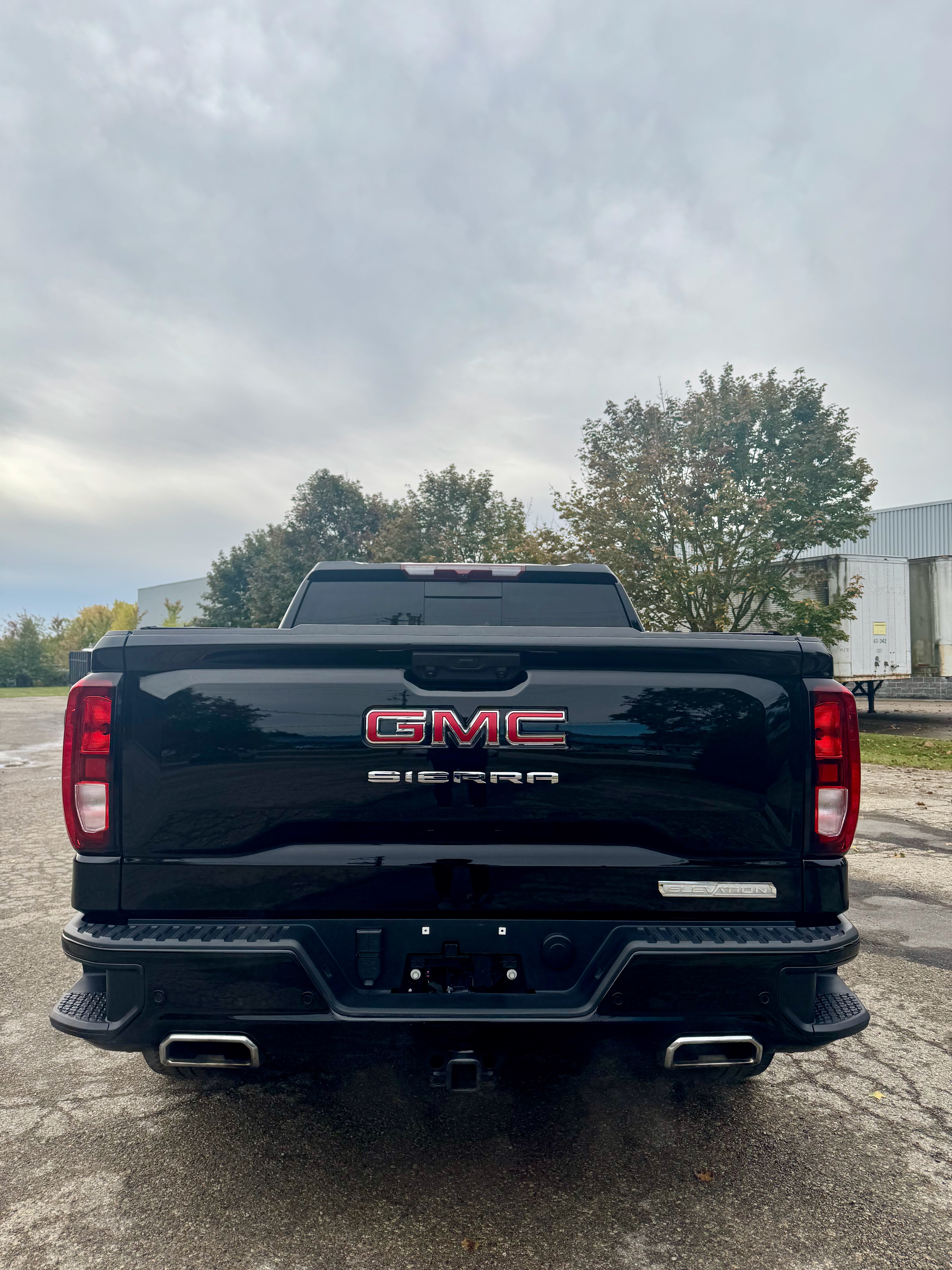 Rear view of black 2024 GMC Sierra protected by Gtechniq CSL 5-year ceramic coating