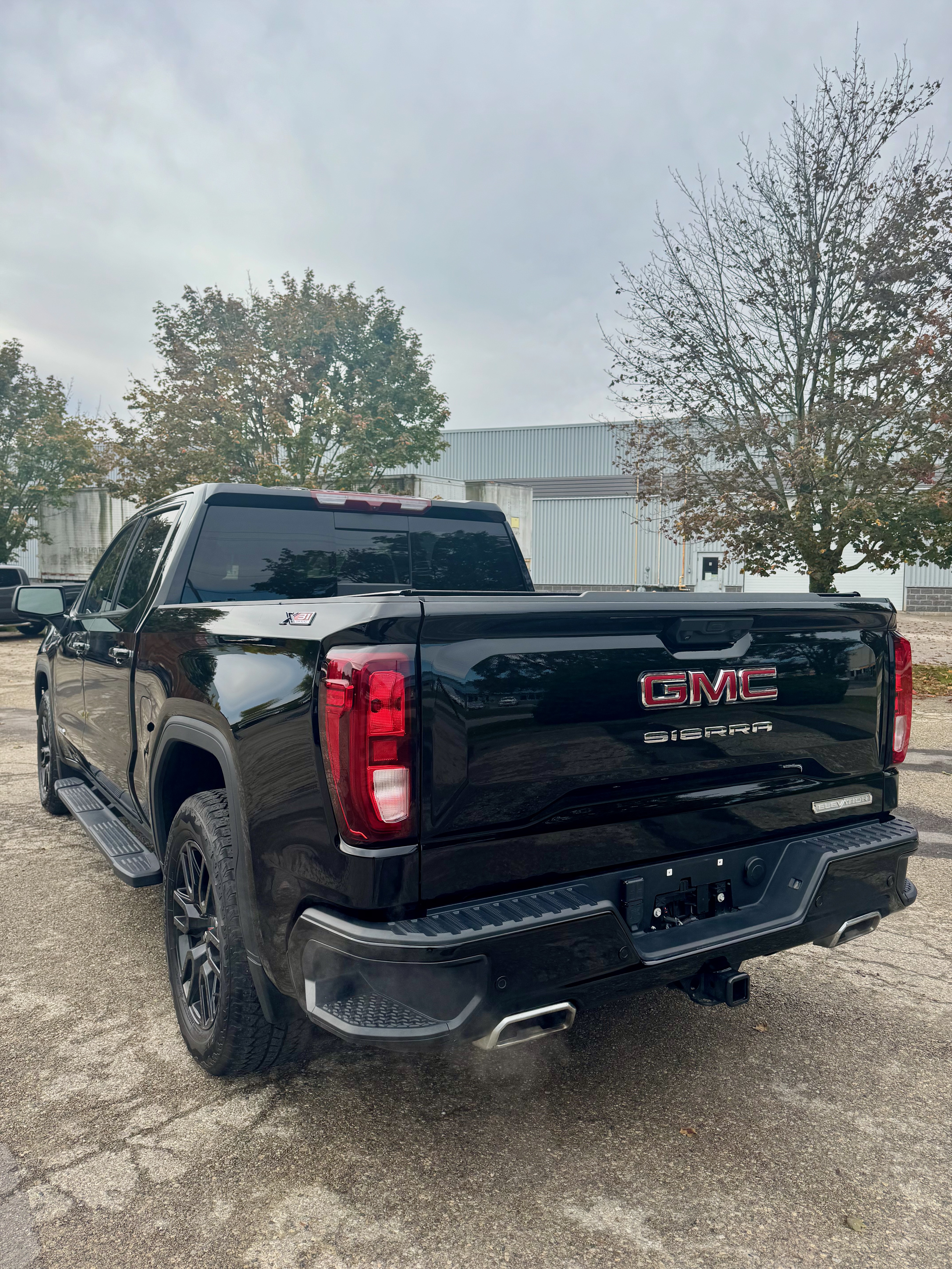 Rear three-quarter view of 2024 GMC Sierra after gloss enhancement polish and Gtechniq ceramic coating